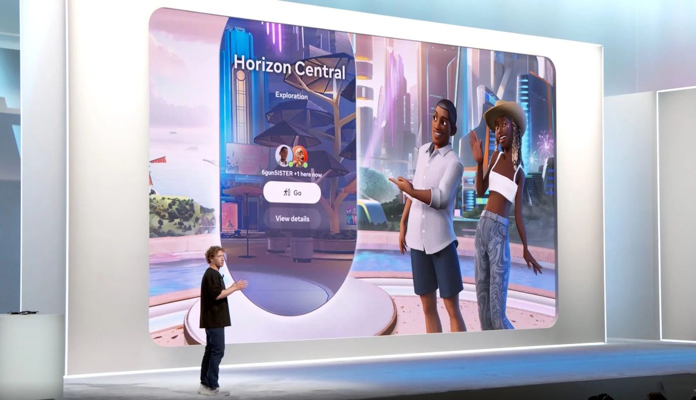 Mark Zuckerberg presenting the Horizon Central travel destination panel at a Meta keynote, showing two avatars greeting each other in a futuristic city